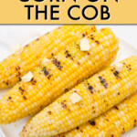 A stack of grilled corn cobs on a plate