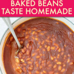 overhead view of baked beans in a dutch oven