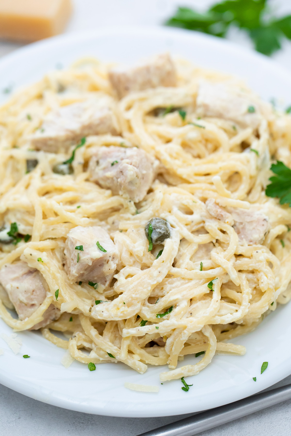 a serving of instant pot chicken alfredo in a white plate