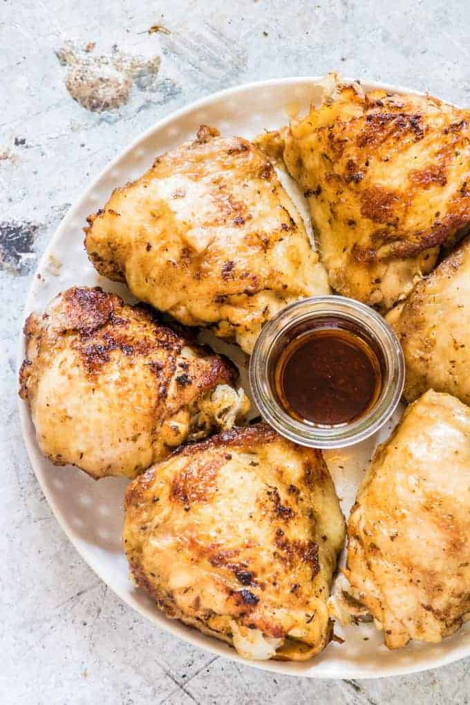 overhead shot of instant pot chicken thighs on a plate