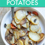 smothered sliced potatoes in a bowl