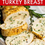 Sliced stuffed turkey breast on a serving platter