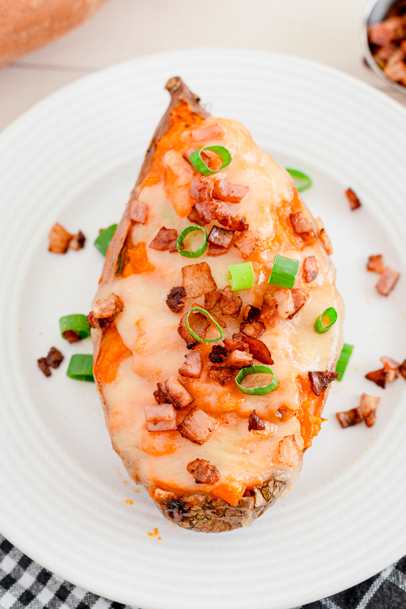 Twice baked sweet potatoes on a white plate.